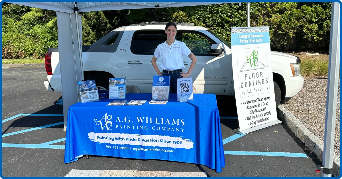 A.G. Williams Painting Company booth at an outdoor event.