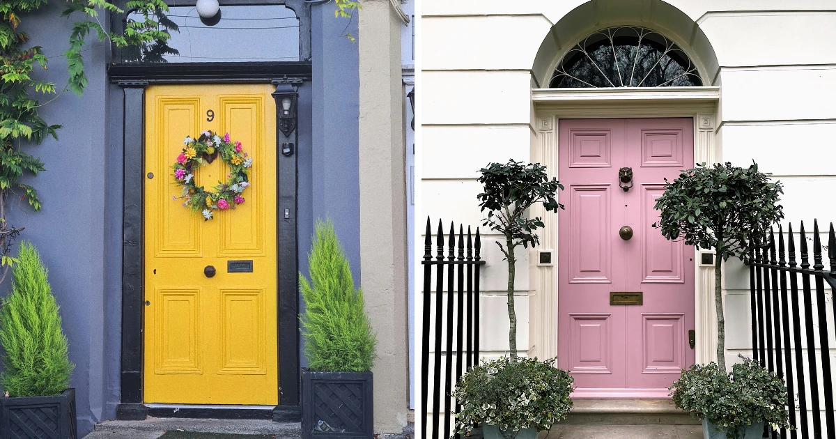 Two side-by-side front doors: a yellow door with a floral wreath on a gray facade, and a pink door framed by an arched white entryway with topiaries.
