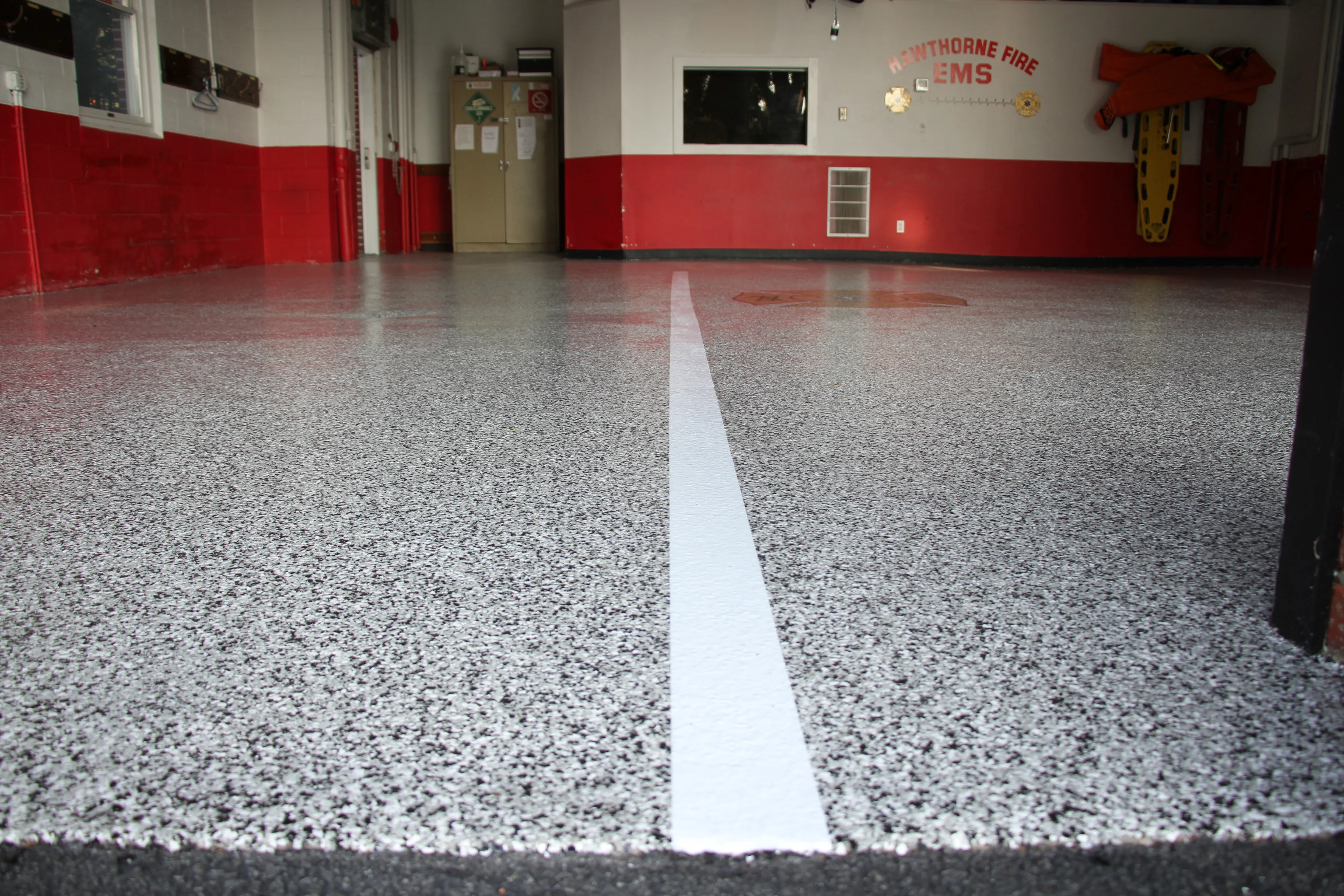 Additional view of the firehouse commercial coating work.