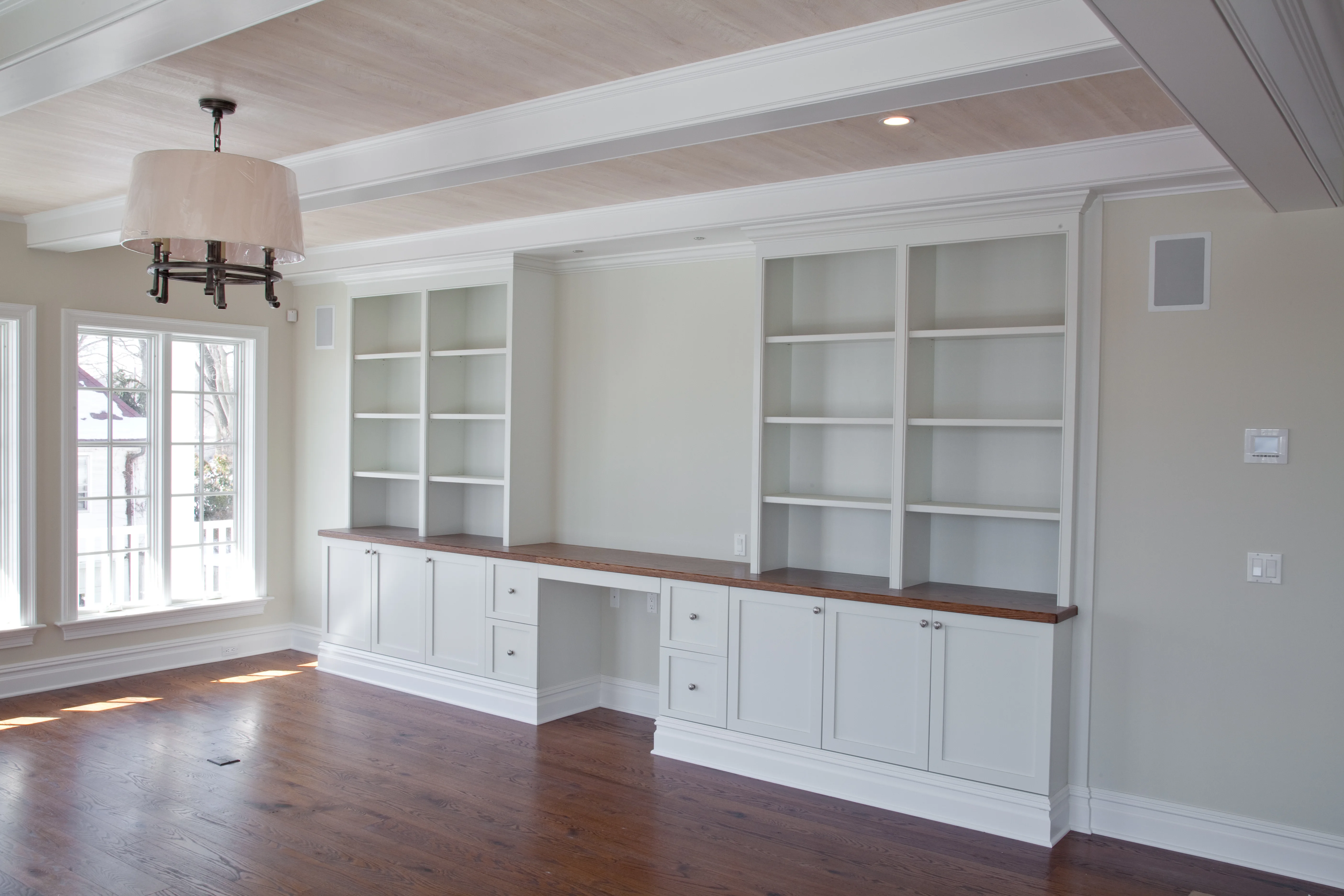 Interior room with finished built-ins and detailed paintwork.